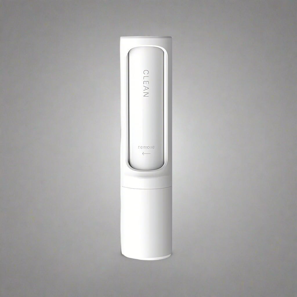 White electronic device with a screen displaying the word 'CLEAN' on a white background