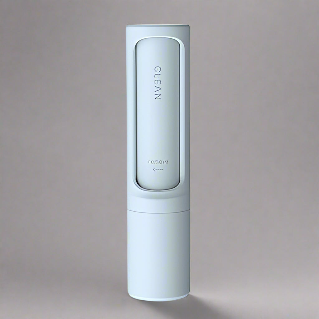 White cleaning device with 'CLEAN' and 'remove' text on a white background