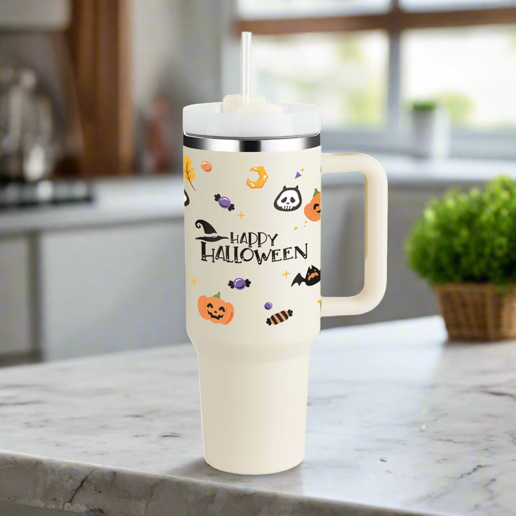 Halloween-themed tumbler with handle on a kitchen counter