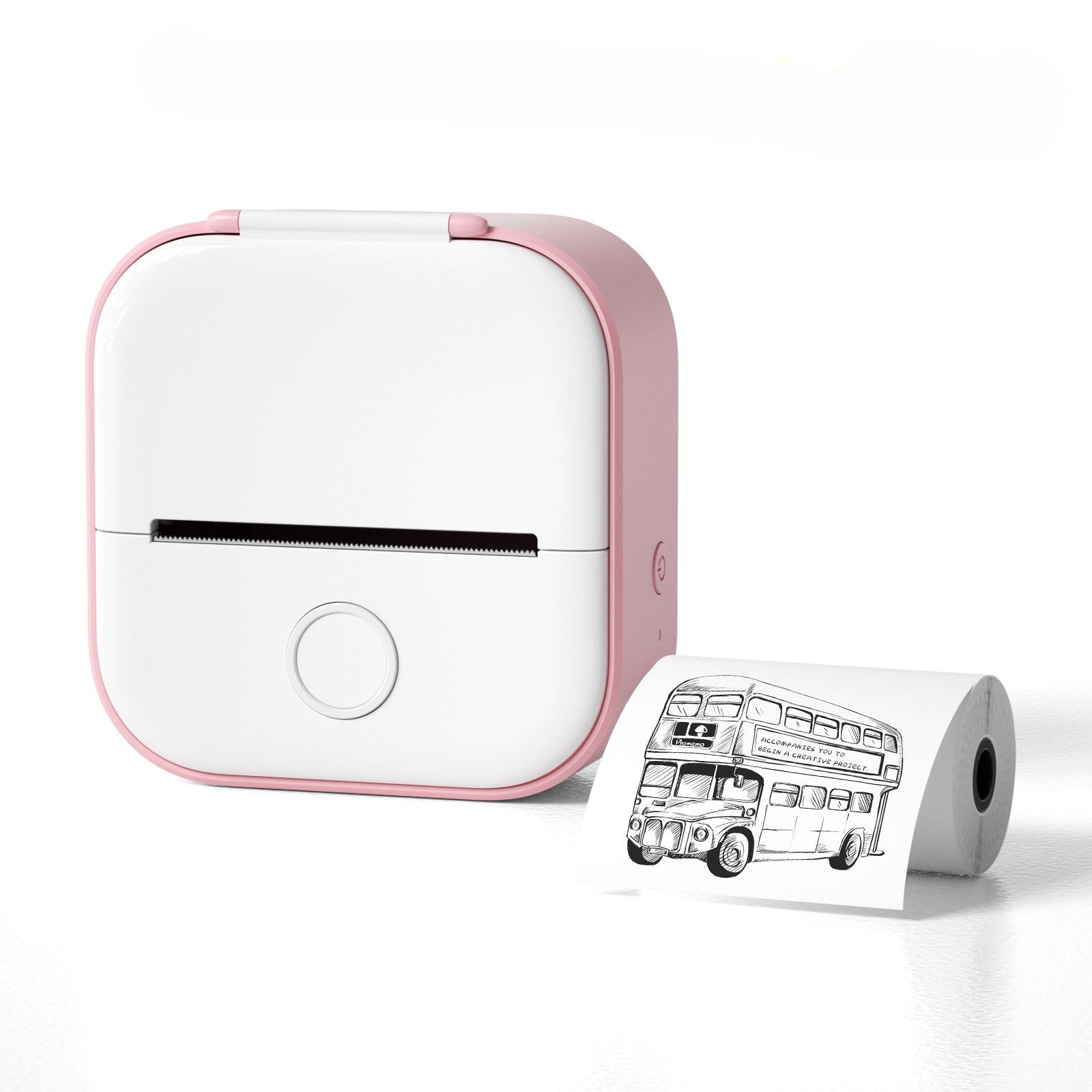 White and pink portable printer with a printed roll of paper featuring a London bus design on a white background.